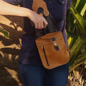 Crossbody bag with holster